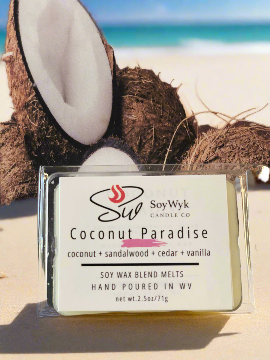 White Soy Wax Melt in a 2.5 oz clear package. Wax Melt on sandy beach front with few coconut behind them. Labeled as “Coconut Paradise”. Featured fragrant notes are coconut , sandalwood, cedar, vanilla. 
Hand-poured in WV by SoyWyk Candle Co. 
